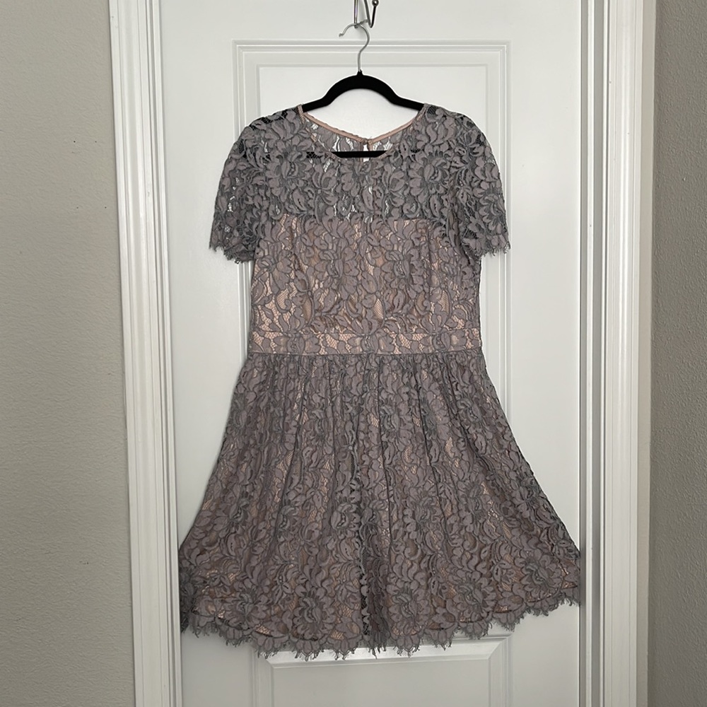 Eliza J. Dress, size 16, lavender color, dress is knee length.